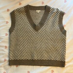 light brown and white vest
